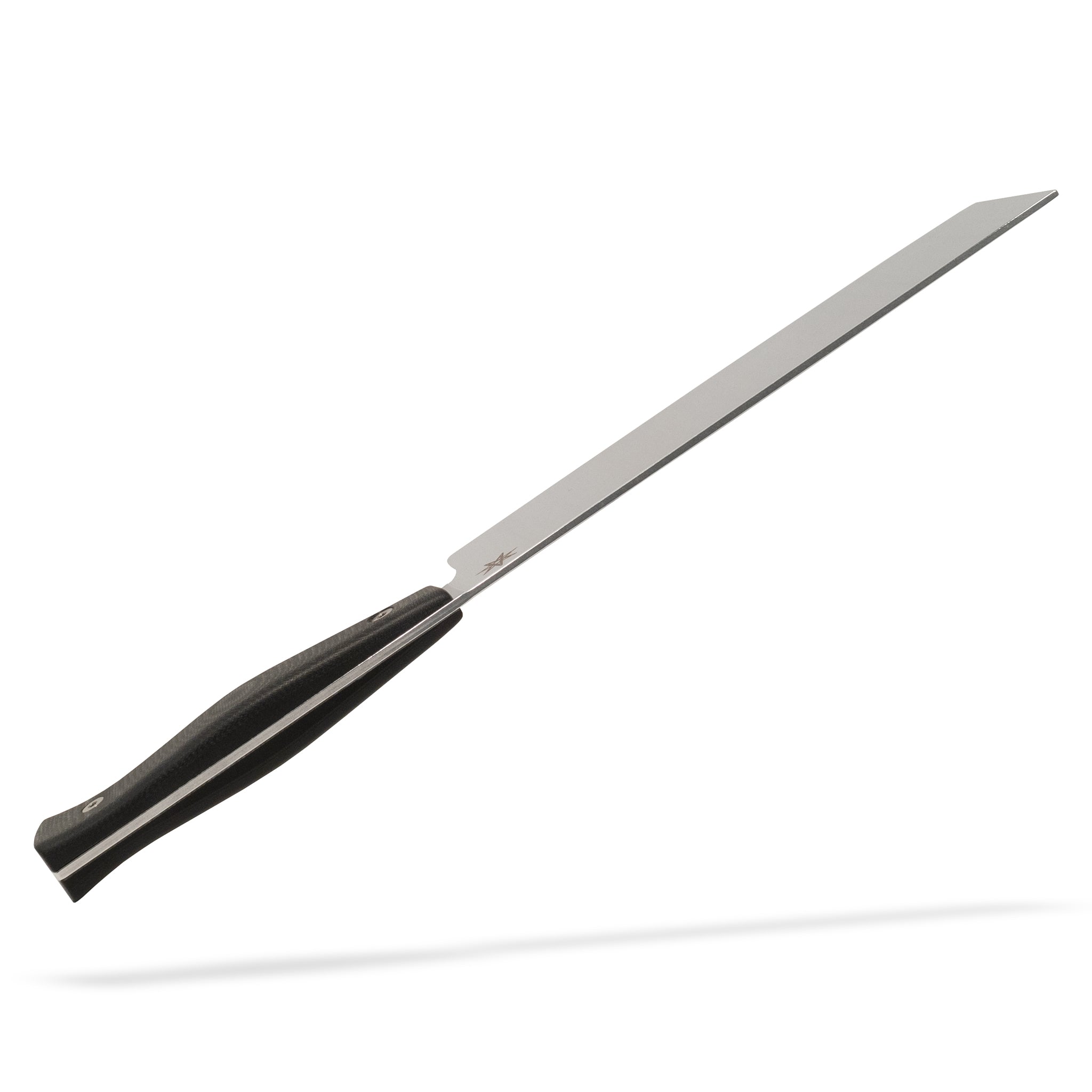 Detail view of Town Cutler Culinary 2.0 nakiri vegetable knife with black g-10 handle and stainless steel blade.