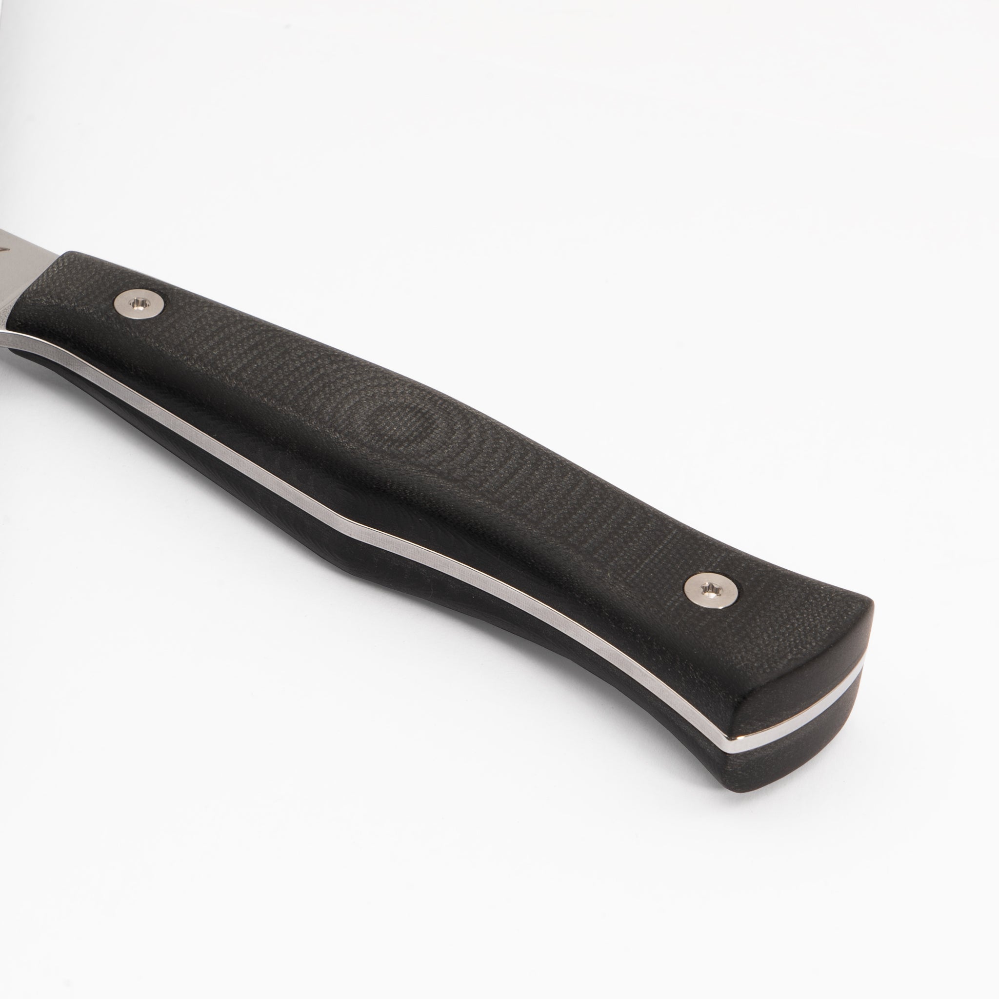 Detail closeup of kitchen knife with black g-10 handle.