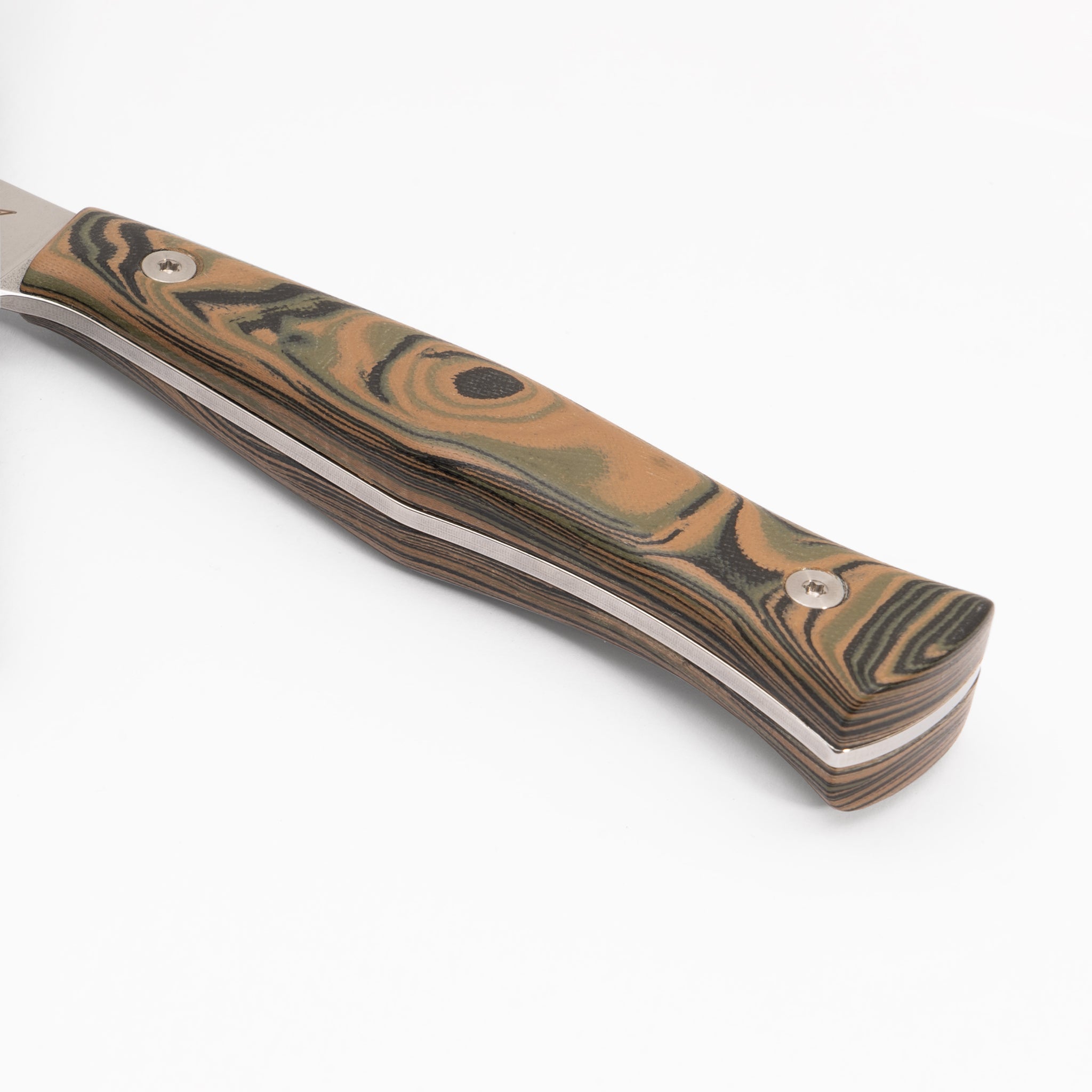 Detail closeup of kitchen knife with black, green, and tan burl g-10 handle.