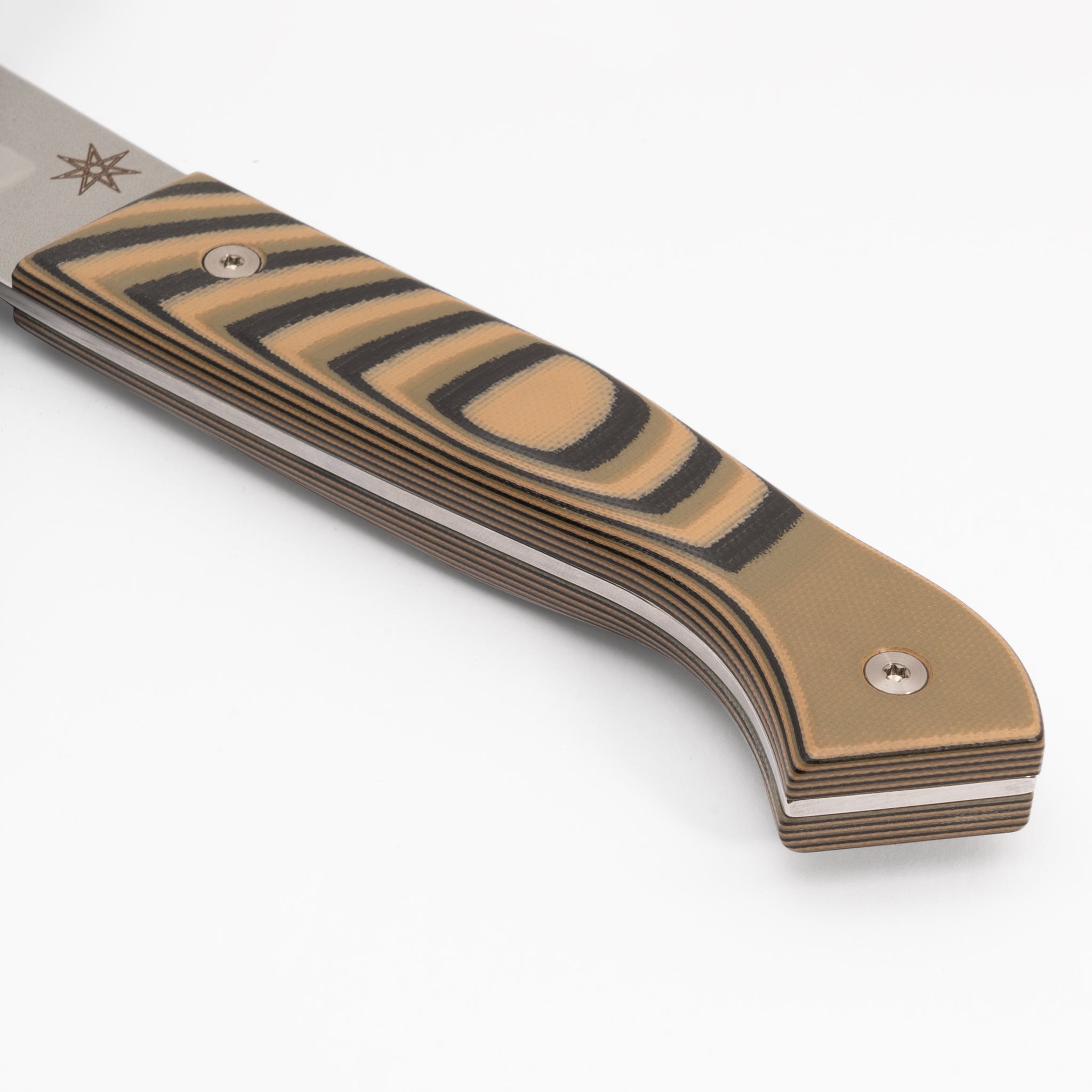 Detail photo of black, green, and tan layered G-10 kitchen knife handle Town Cutler