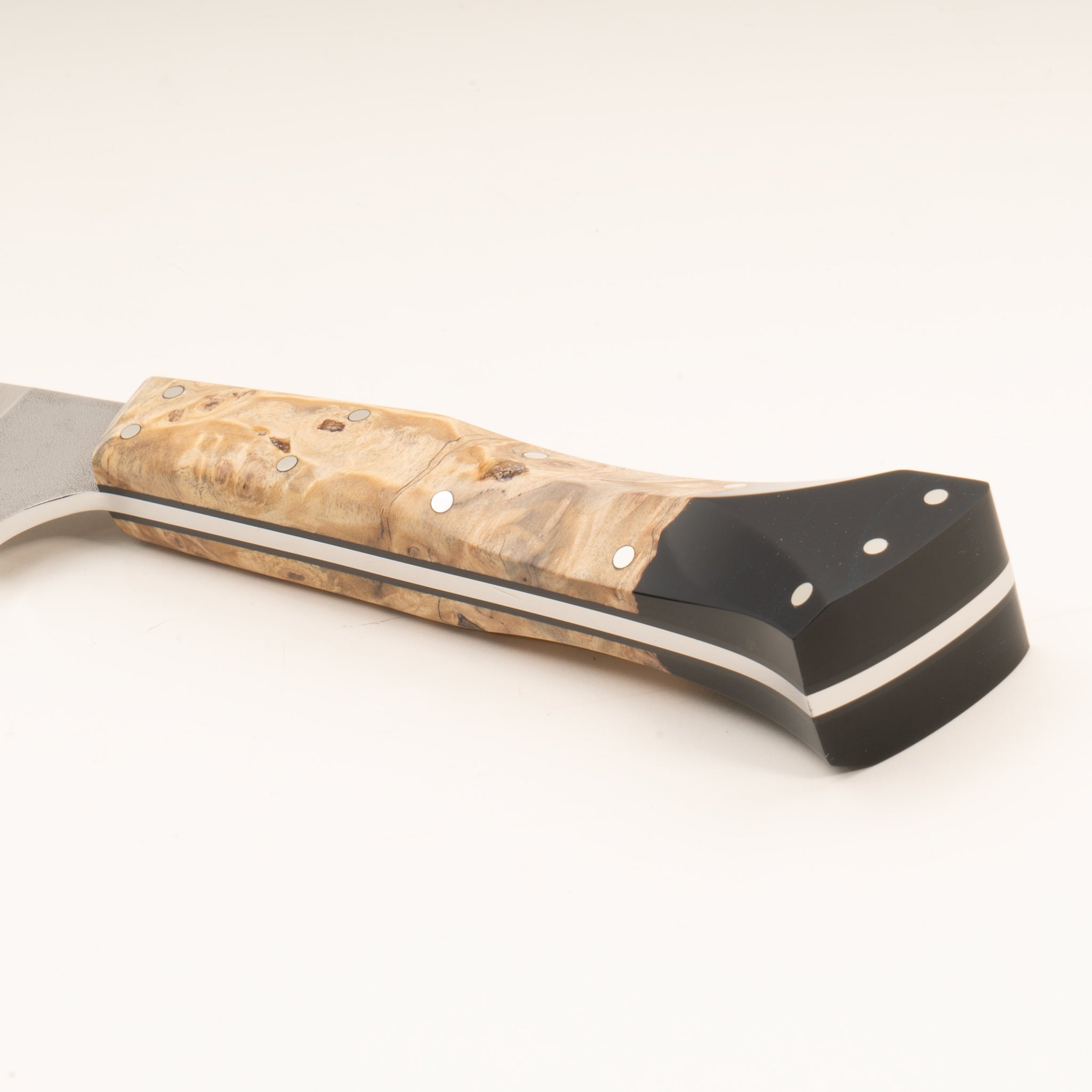 Detail view of knife handle for Town Cutler Desert Dawn Curved Boning Knife.