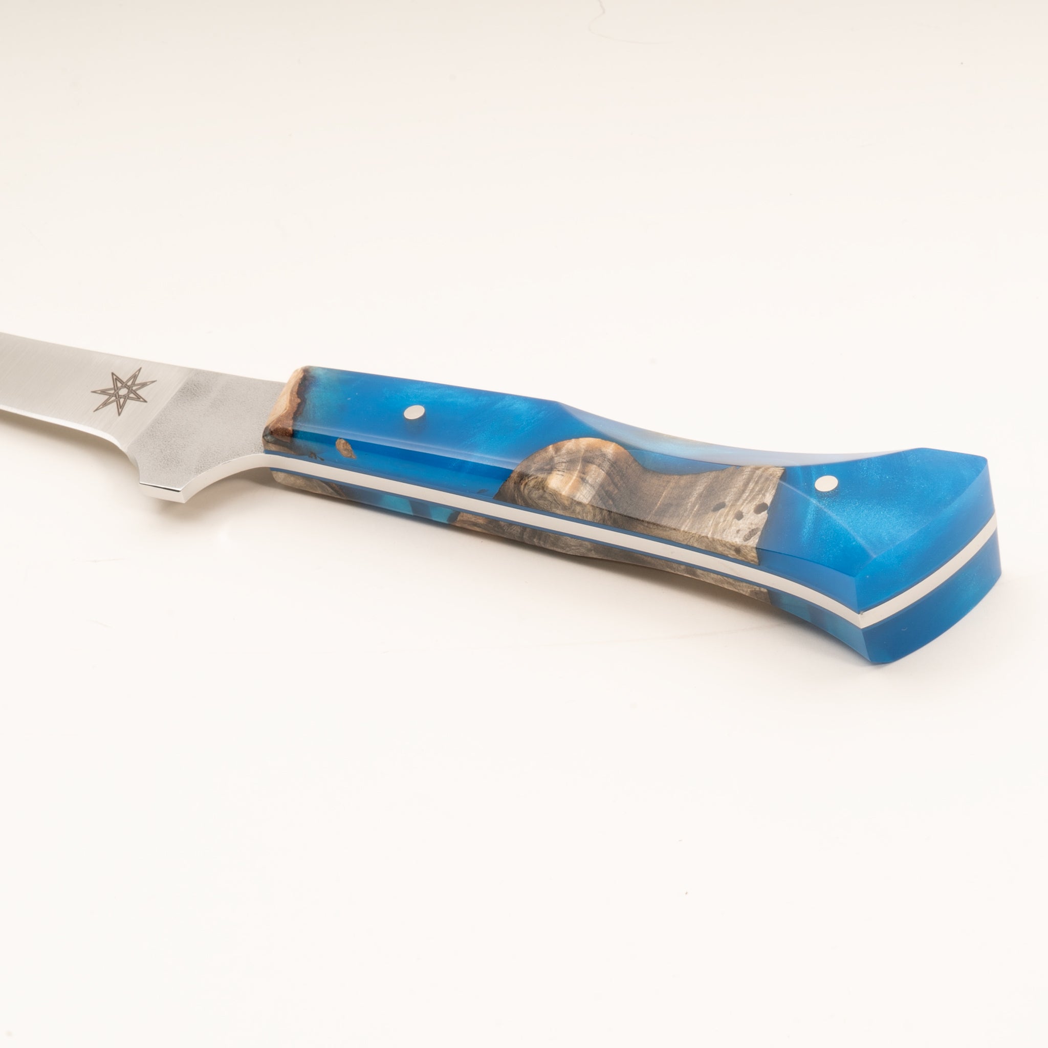 Close-up photo of a curved boning knife blue and wood handle on a white background.