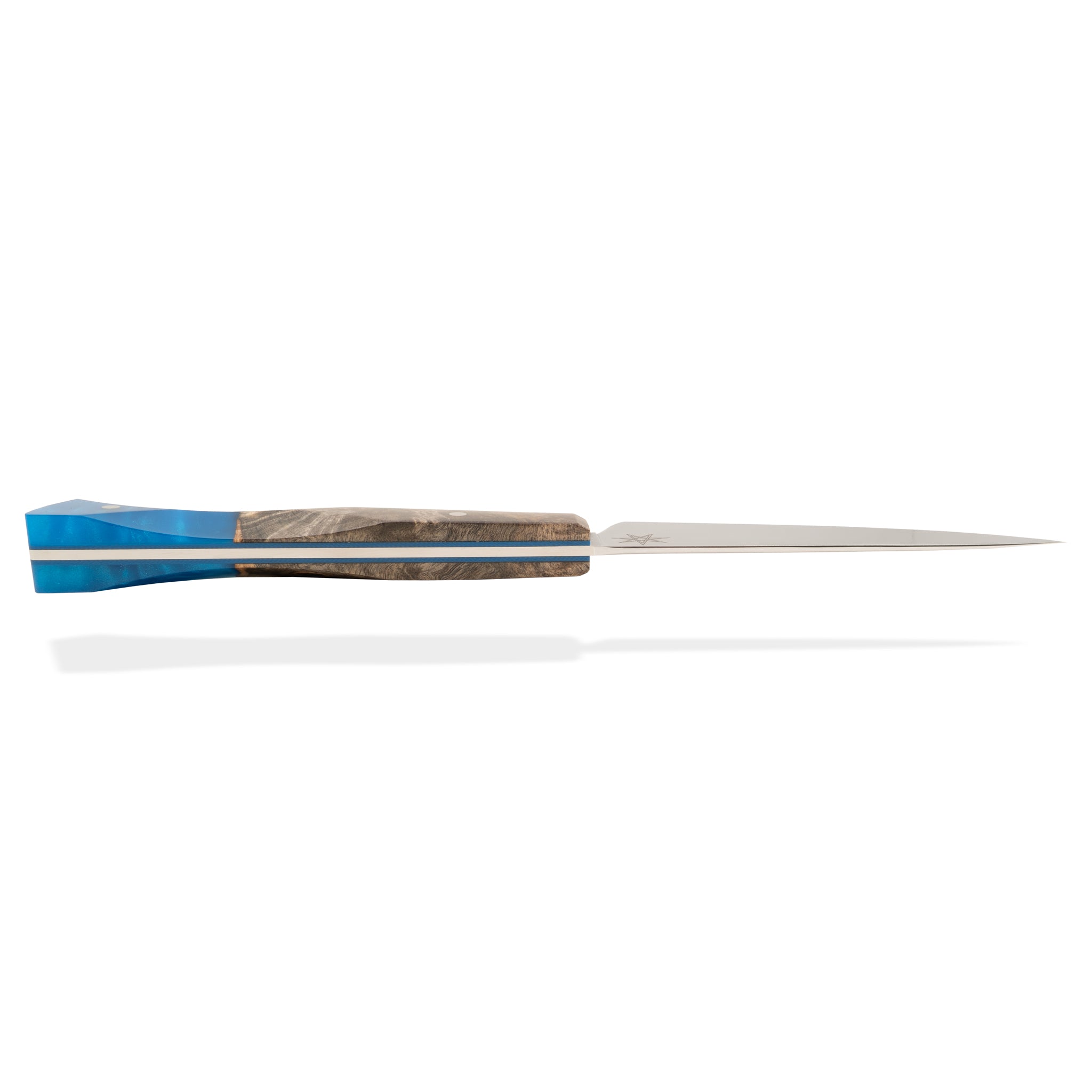 Detail photo of Tahoe Bliss stainless steel paring knife with buckeye burl wood and blue resin handle by Town Cutler.