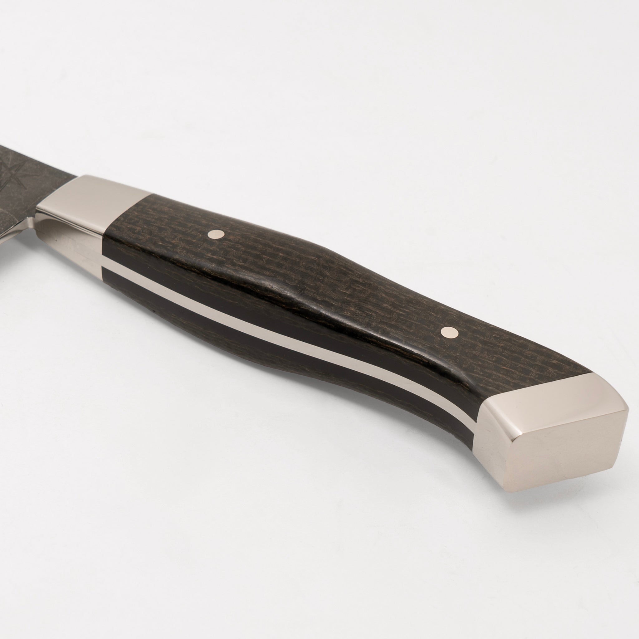 Detail photo of handle on 6" Carbon Steel Honesuki Butcher Knife with Stonewash Finish Blade, Black Burlap Micarta Handle, Stainless Steel Bolster and Pommel by Town Cutler