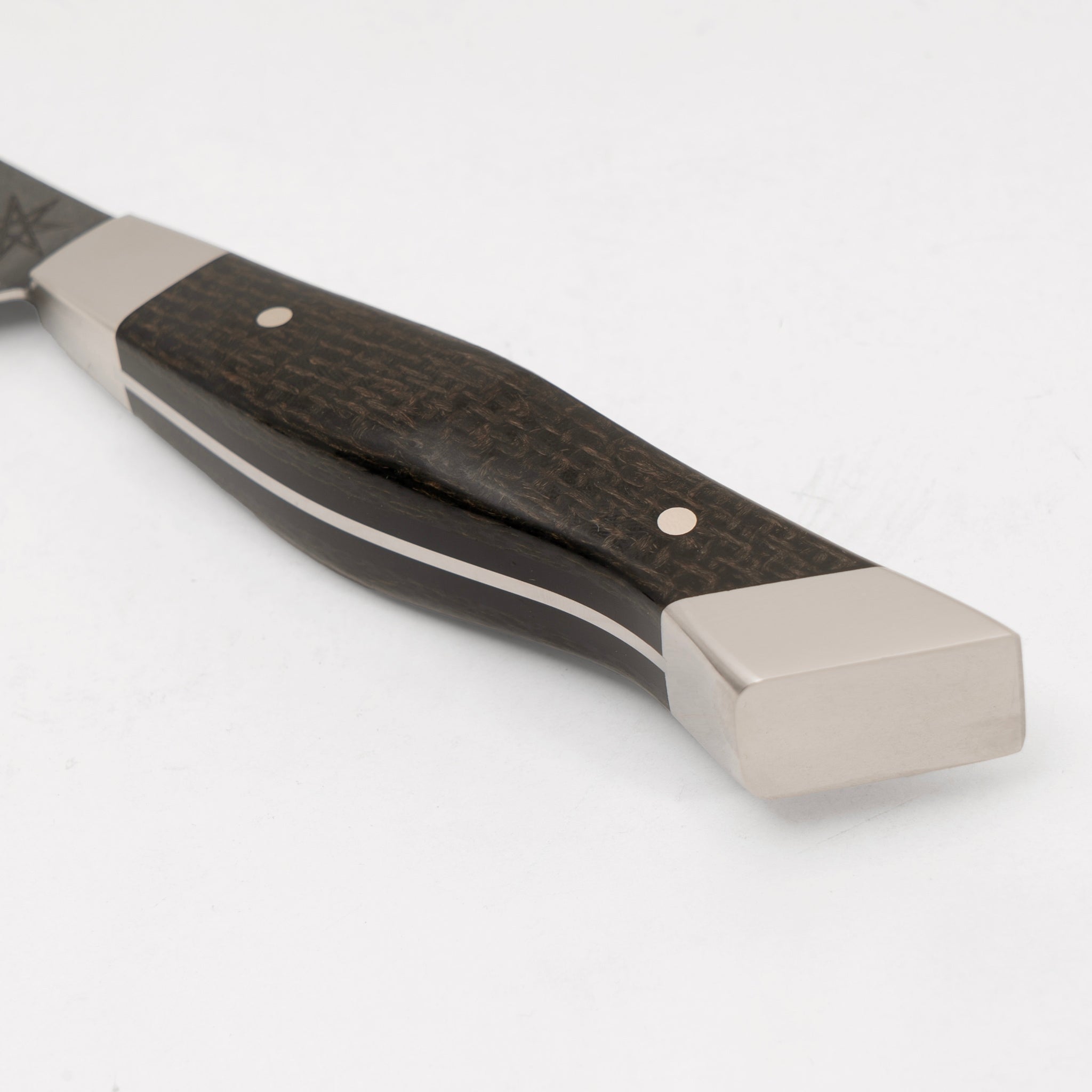 Detail photo of handle on 3" Carbon Steel Paring Knife with Stonewash Finish Blade, Black Burlap Micarta Handle, Stainless Steel Bolster and Pommel by Town Cutler