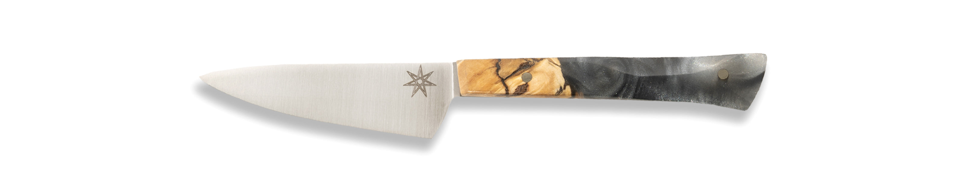 A paring knife with a silver gray resin and wood handle on a white background.