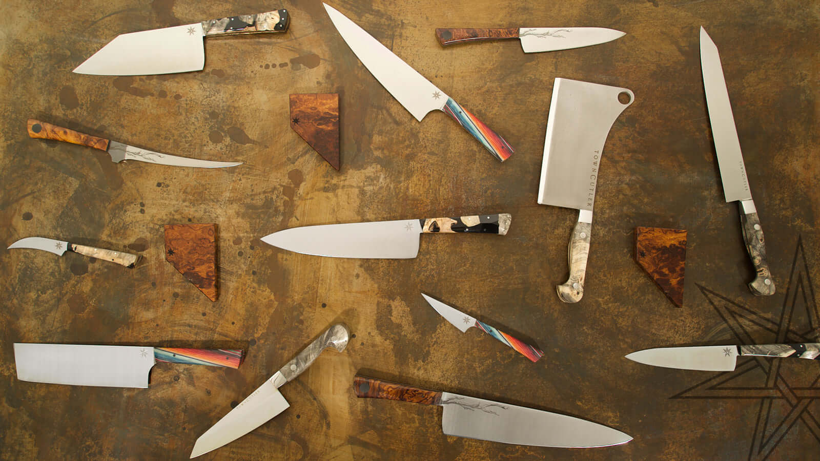 Town Cutler Kitchen Knives on a steel patina background.