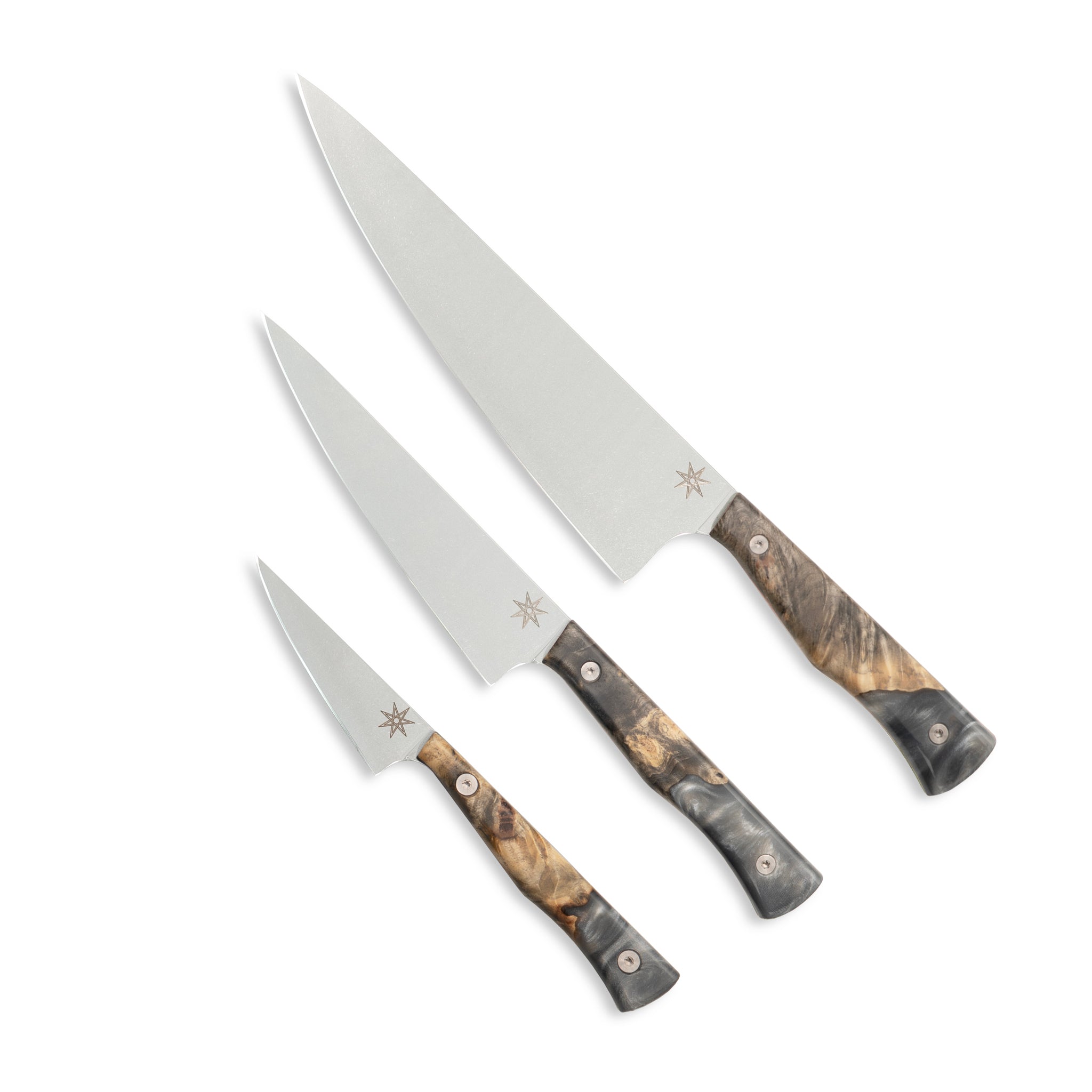 Knife set with three kitchen knives with wood and resins handles on a white background 