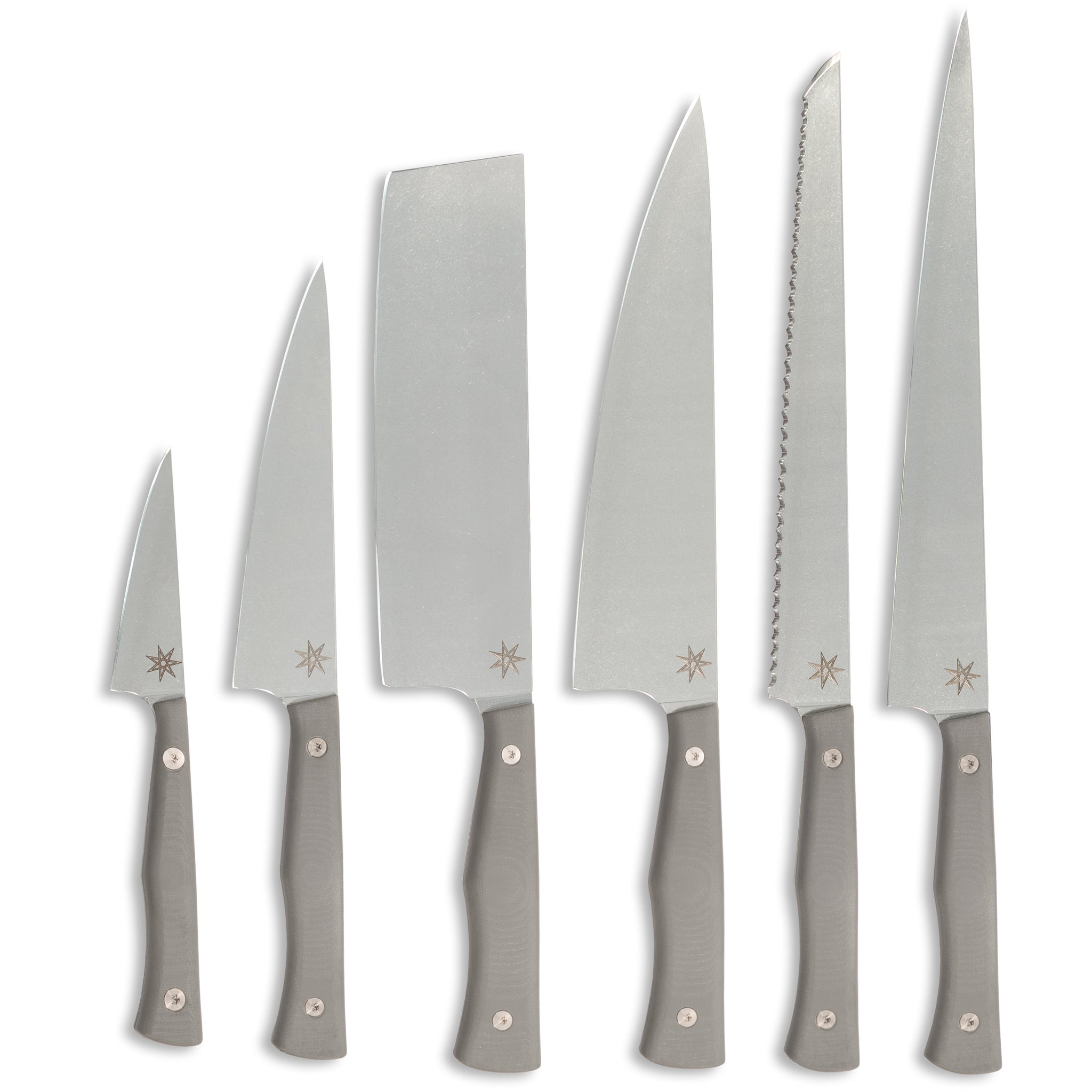 Six piece knife stainless steel knife set with gray handles.