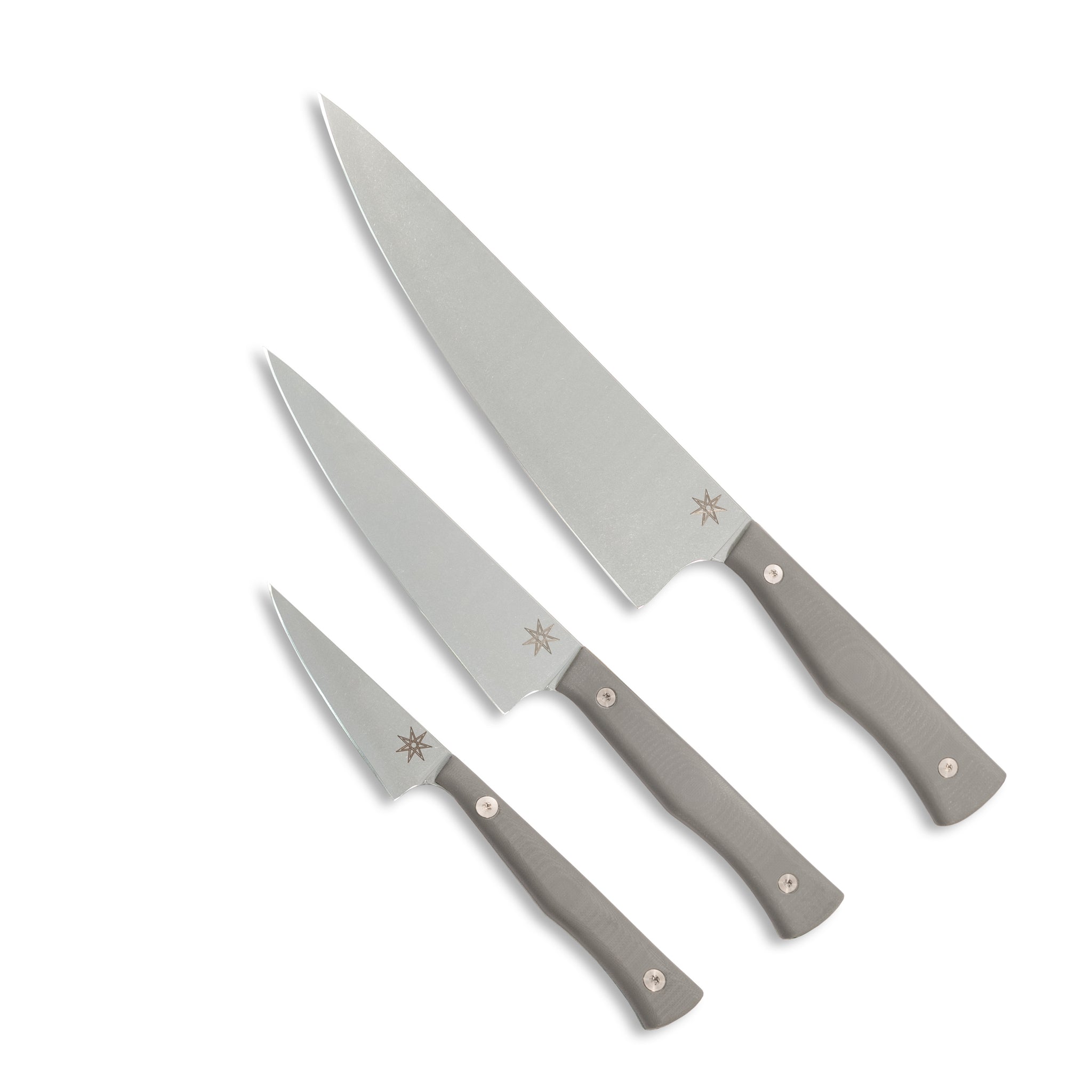 Three piece knife set consisting of a paring , utility, and chef knife with gray handles.