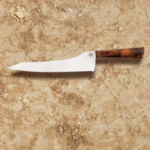 9" serrated bread knife made with stainless steel blade and ironwood wooden handle allowing plenty of knuckle space.