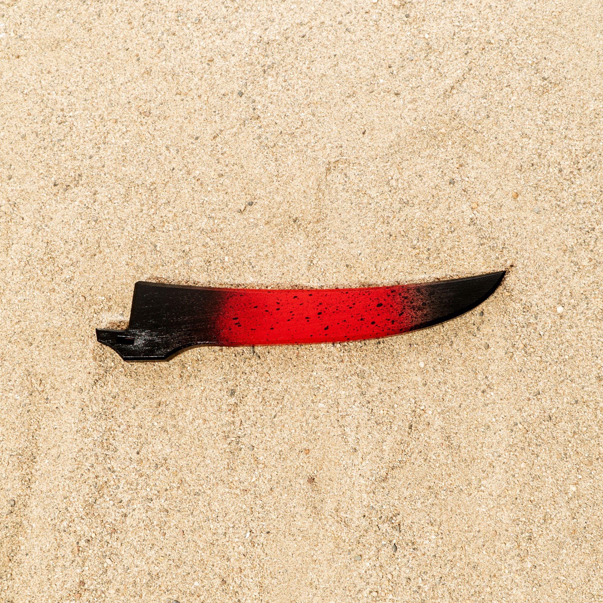 Red and black wood saya knife sheath for Town Cutler Baja curved boning knife.