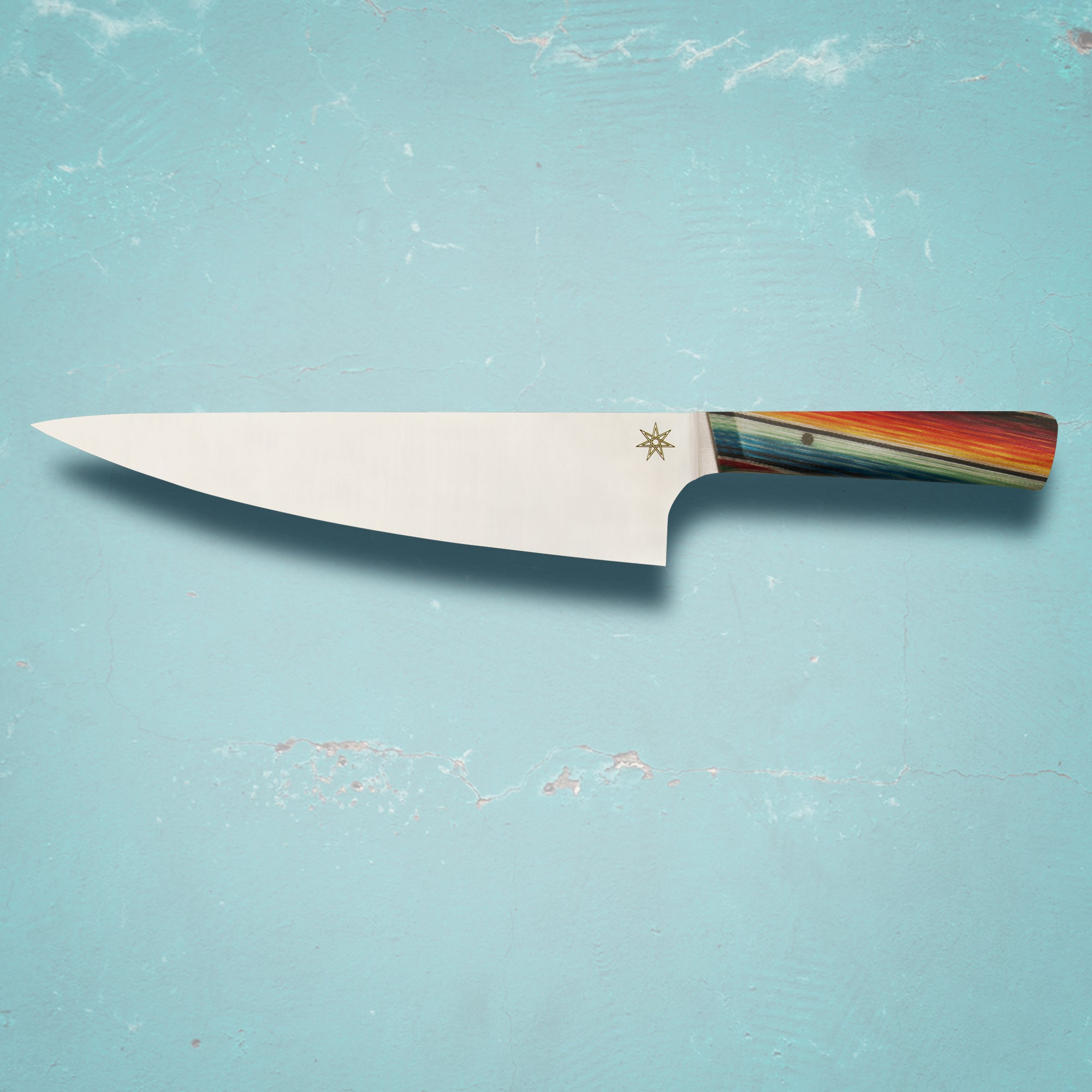 8.5" Chef knife by Town Cutler featuring the Baja “Mexican Blanket Especial” handle and stainless steel blades. The most popular chef knife size in Town Cutler products. Unique, colorful handle is fun yet sophisticated.